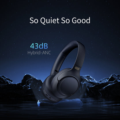 Black QCY H3 headphones with 43dB hybrid ANC, shown in a serene night setting emphasizing quiet performance.