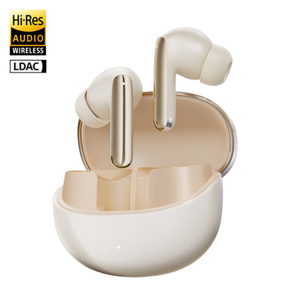 Gold QCY MeloBuds Pro earbuds in open case, featuring Hi-Res Audio, LDAC, and Muse Design Awards logo.